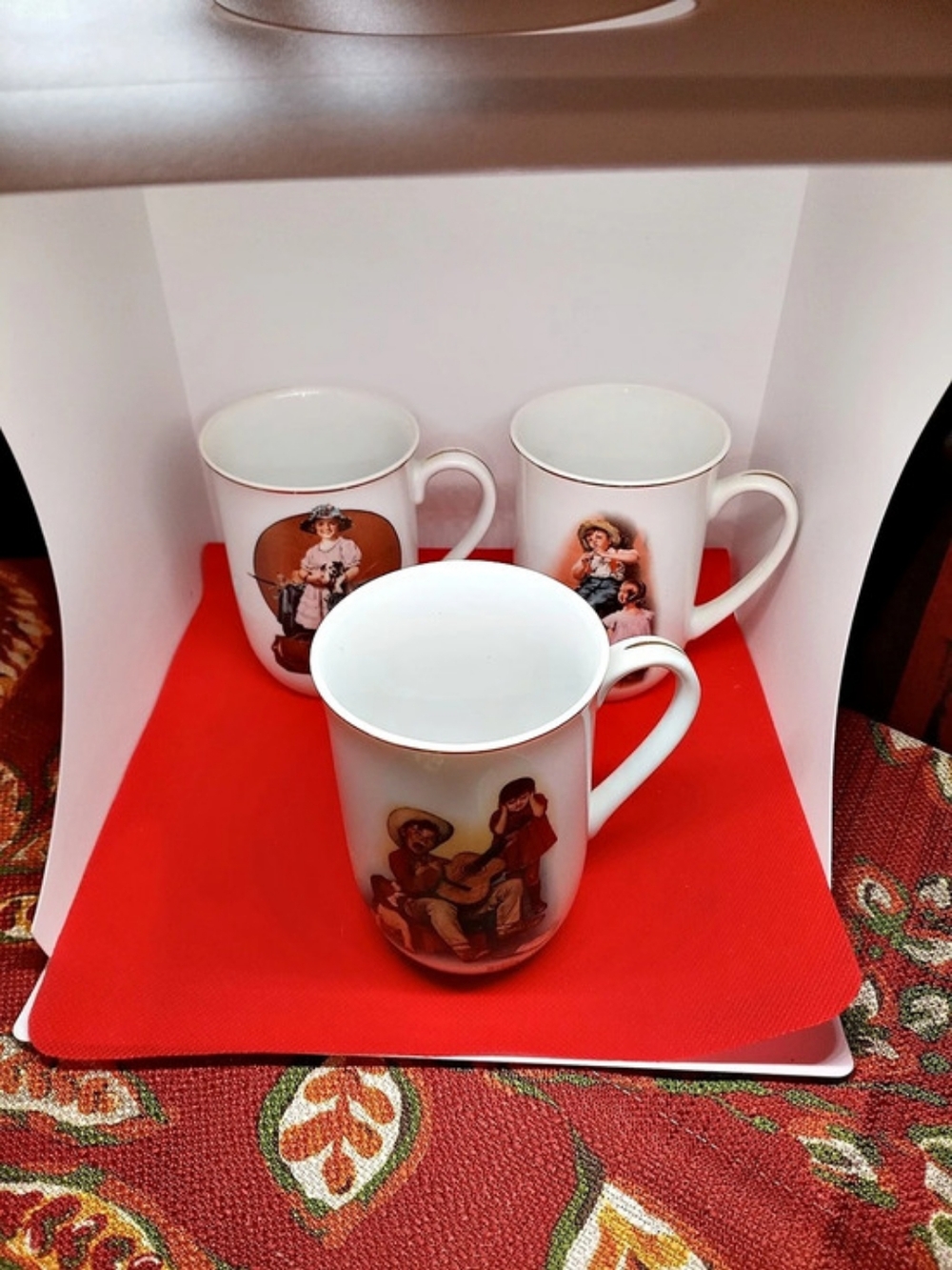 H.M.I. Norman Rockwell 1981 Collector Mugs. Set of 3 White Red